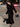 Elegant Ellie Skirt Suit with trumpet silhouette and turn-down collar, perfect for formal occasions.
