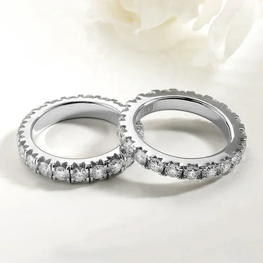 Elegant Moissanite Eternity Ring featuring round cut stones, perfect for women, includes GRA certificate and box.